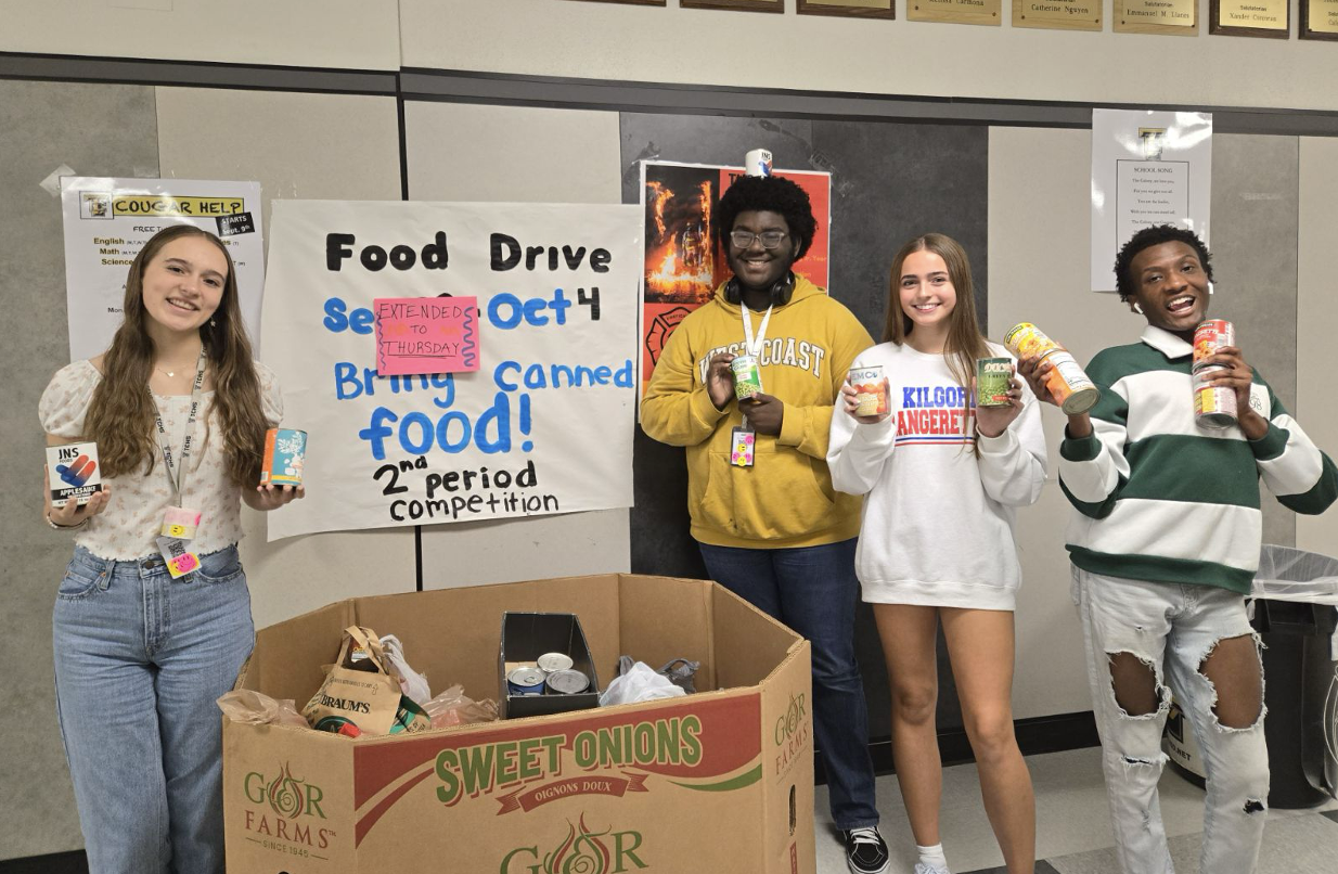 The Colony High School students pose with their donations to CCA's Food Pantry for LISD's Food Drive. October 2024